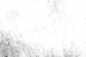 Abstract dusty and grungy scratch texture material or surface. The particles of charcoal splatted on white background. black dust particles explode isolated on white background photo