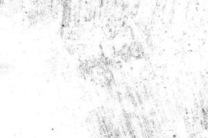 Abstract dusty and grungy scratch texture material or surface. The particles of charcoal splatted on white background. black dust particles explode isolated on white background photo