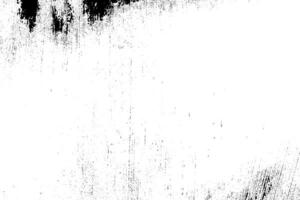Abstract dusty and grungy scratch texture material or surface. The particles of charcoal splatted on white background. black dust particles explode isolated on white background photo