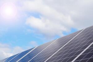 Solar panel against blue sky photo