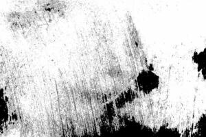 Abstract dusty and grungy scratch texture material or surface. The particles of charcoal splatted on white background. black dust particles explode isolated on white background photo