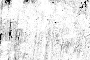 Abstract dusty and grungy scratch texture material or surface. The particles of charcoal splatted on white background. black dust particles explode isolated on white background photo