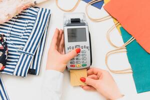 paying through smartphone using NFC technology. payment by phone through the terminal photo
