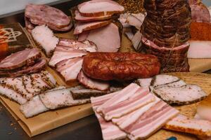 Different types of sausages and meat products photo
