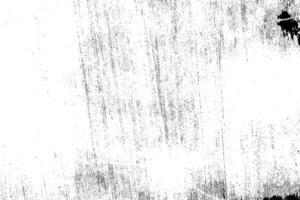 Abstract dusty and grungy scratch texture material or surface. The particles of charcoal splatted on white background. black dust particles explode isolated on white background photo