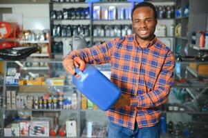 A salesman in an auto parts store photo