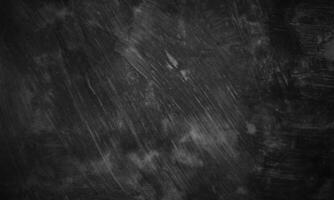 Black concrete texture as a concept of horror and Halloween. Dark wall background cement or stone. photo