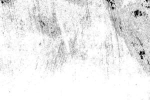 Abstract dusty and grungy scratch texture material or surface. The particles of charcoal splatted on white background. black dust particles explode isolated on white background photo