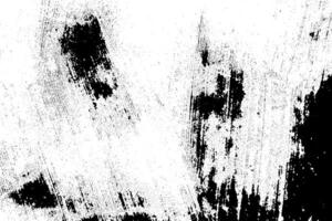 Abstract dusty and grungy scratch texture material or surface. The particles of charcoal splatted on white background. black dust particles explode isolated on white background photo