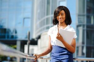 A shot of a beautiful black businesswoman outdoor photo