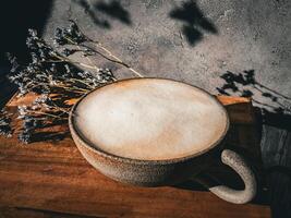 a cup of fresh cappuccino photo