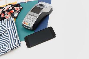 paying through smartphone using NFC technology. payment by phone through the terminal photo