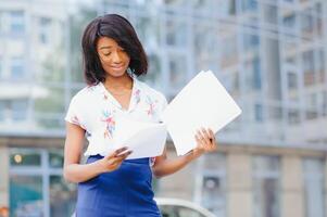 A shot of a beautiful black businesswoman outdoor photo