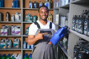 Smiling african Salesman Auto Parts Store photo