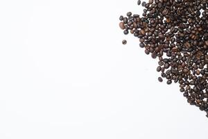 Word coffee made from coffee beans isolated on white background photo