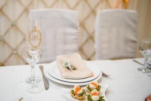 wedding glasses on the brides table photo