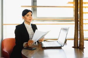 young business woman at the office photo