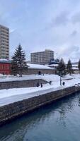 sapporo, Japan, 2024 - otaru kanal under snöfall i vinter, Japan, snö festival. video