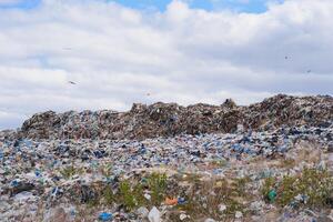 Scrap heap - Scrap Metal ready for recycling with blue sky photo