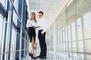 Business partners meeting inside building photo