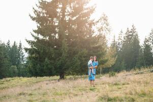 mother and son having rest on vacation in mountains. photo