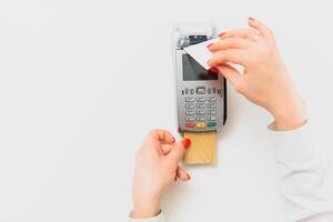 paying through smartphone using NFC technology. payment by phone through the terminal photo