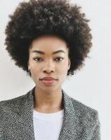 AI generated black woman with a deep gaze and afro pop style photo