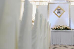 an image of tables setting at a luxury wedding hall photo