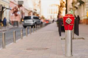 Typical american red fire hydrant photo