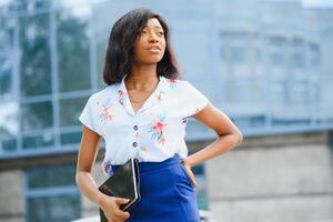 A shot of a beautiful black businesswoman outdoor photo