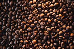 The Roasted coffee beans background. photo