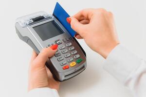 paying through smartphone using NFC technology. payment by phone through the terminal photo