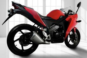 full rear body view of red sports type motorbike with fuel injection system, 250 cc engine, photo