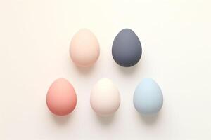 AI generated Five colorful Easter eggs ranging from dark teal to ivory and mustard are aligned on a soft creamy background, depicting a minimalistic concept. Image for cooking or Easter. photo