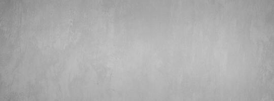Minimalist Loft, Grey Cement Wall Perfect for Facebook Covers, Ideal Backdrop for Text and Graphics. photo