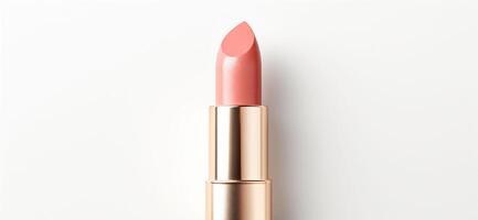 AI generated An peach fuzz color lipsticks top in a golden case on a white background. Make up a product show off. Copy space. photo
