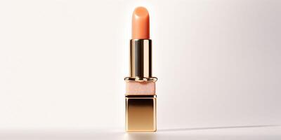 AI generated An peach fuzz color lipstick in a golden and black case on a white background. Make up a product show off. Copy space. photo