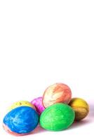 Colorful easter eggs on a white background with space for text. photo