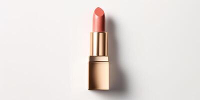 AI generated An peach fuzz color lipstick in a golden case on a white background. Make up a product show off. Copy space. photo