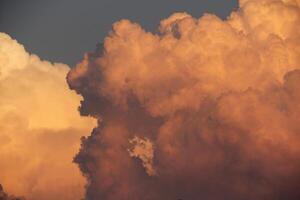 a large cloud is in the sky photo