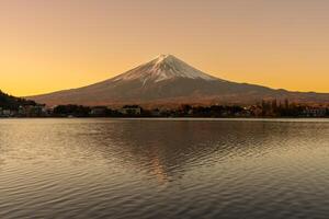 Mount Fuji at Lake Kawaguchi in the morning sunrise. Mt Fujisan in Fujikawaguchiko, Yamanashi, Japan. Landmark for tourists attraction. Japan Travel, Destination, Vacation and Mount Fuji Day concept photo