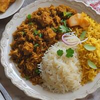 AI generated a plate of food with rice, chicken, and vegetables photo