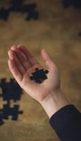 AI generated The hand with the black puzzle piece in it, symbolism of the struggle for equality photo