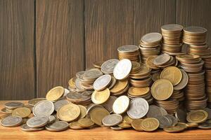 AI generated Monetary arrangement Pile of coins on a wooden table photo
