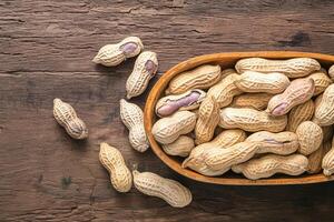 AI generated Southern comfort Boiled peanuts arranged on a rustic wooden table photo