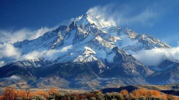 ai generado majestuoso montaña rango con nubes foto