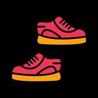 icono de vector de zapatillas