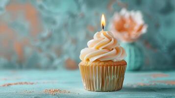 AI generated A top gold candle on a cupcake set against a soft pastel blue backdrop photo