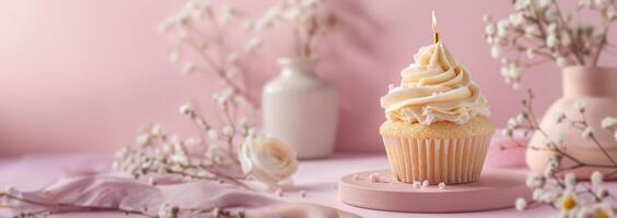 AI generated A top gold candle on a cupcake set against a soft pastel pink backdrop photo