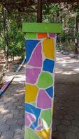 colorful geometric pattern mural pillars photo